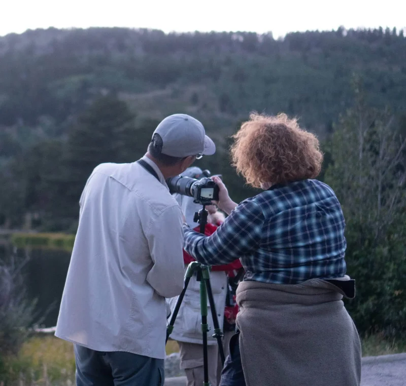 Two people photographing scenery in Rocky Mountain National Park
