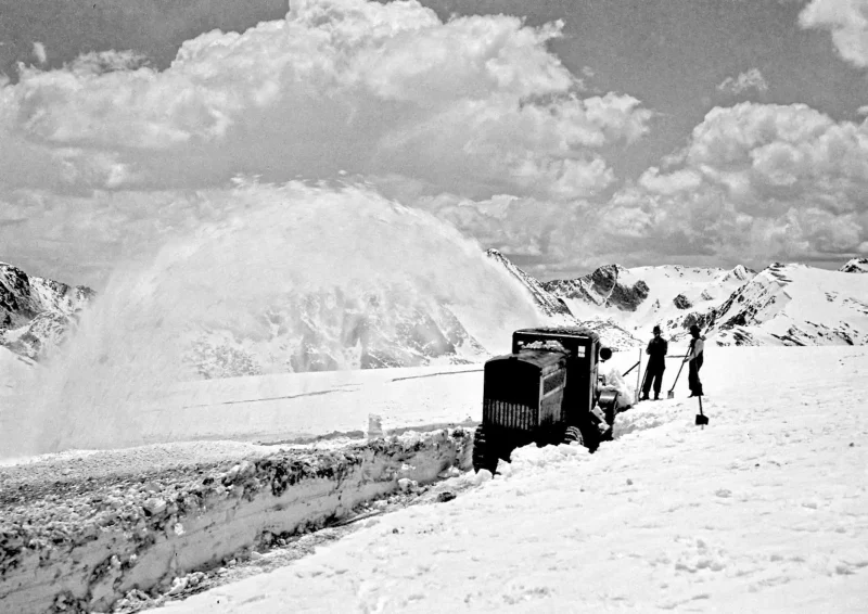 Historic snow-clearing crew and equipment in the Rocky Mountains